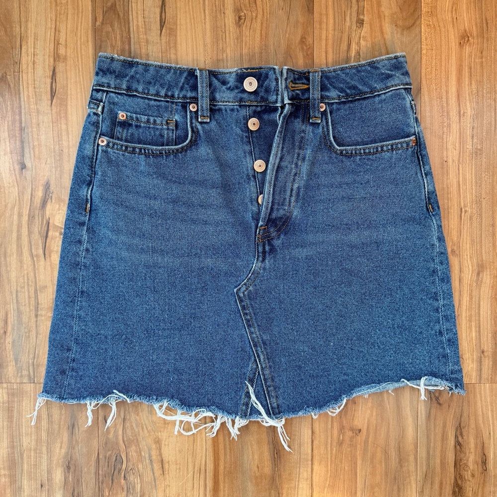 H&M Blue Denim Mini Skirt. Size 4. Never worn.